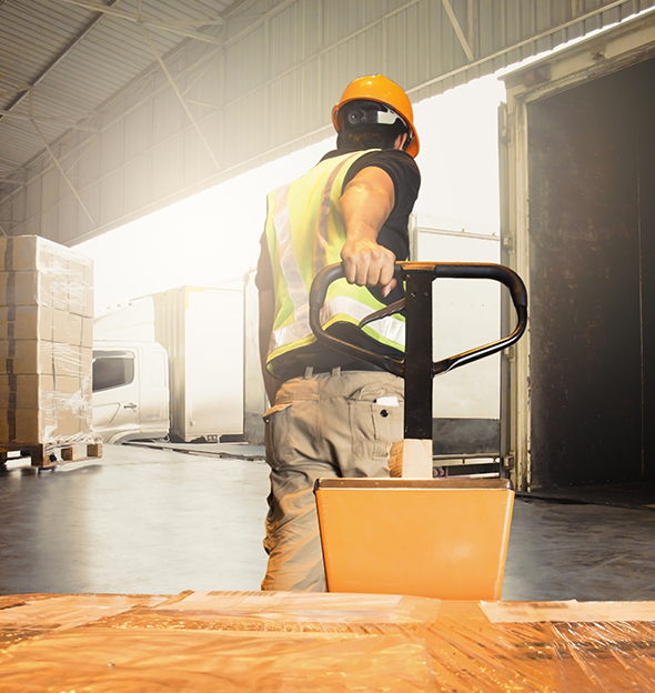 warehouse worker pulling boxes