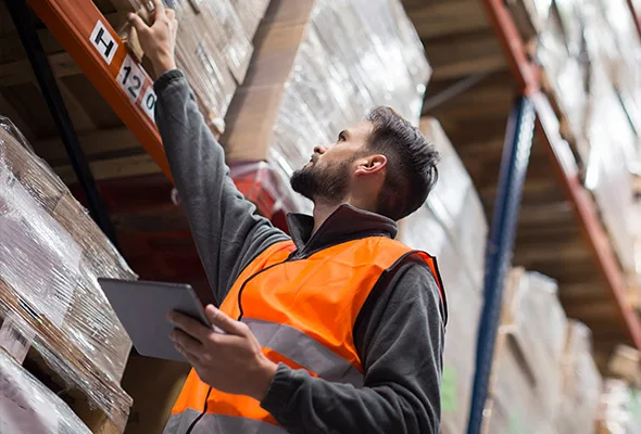 warehouse worker checking inventory