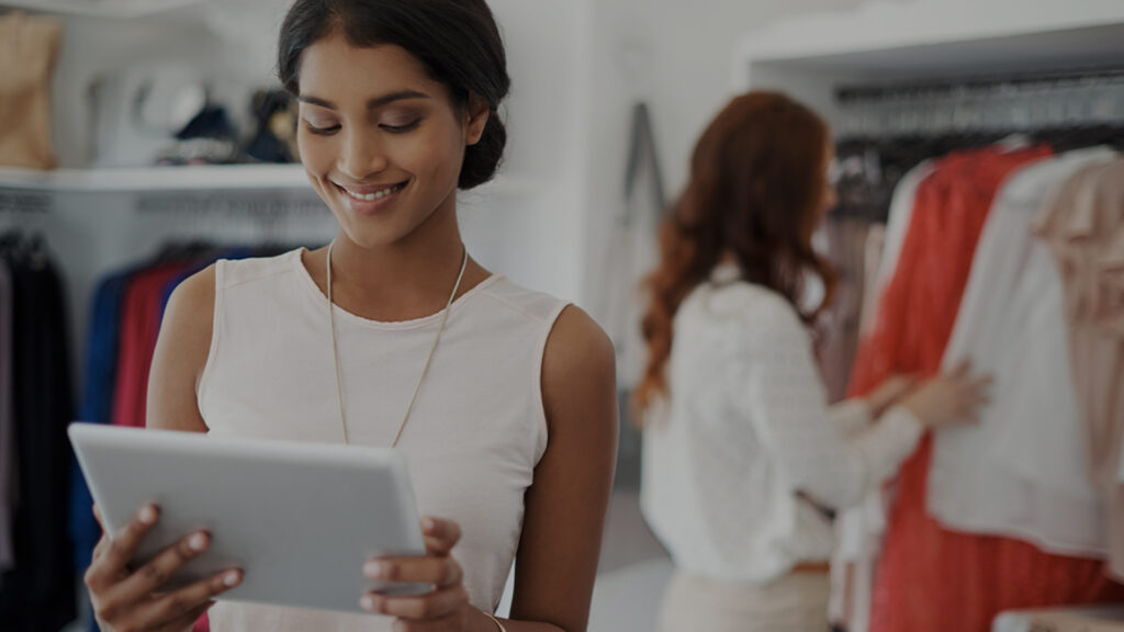 woman looking a tablet