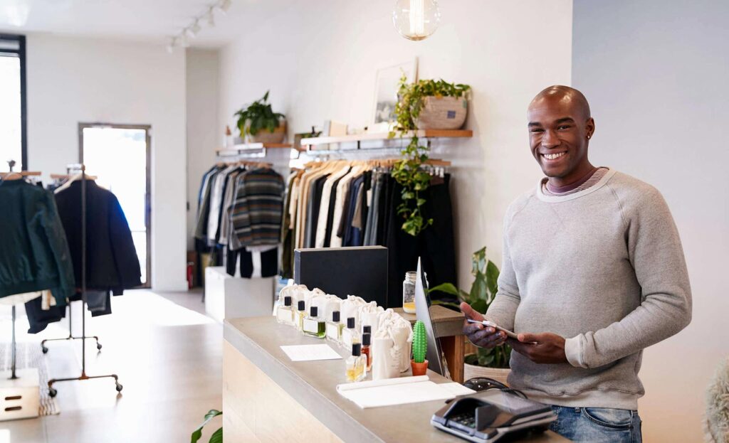 man standing in apparel store